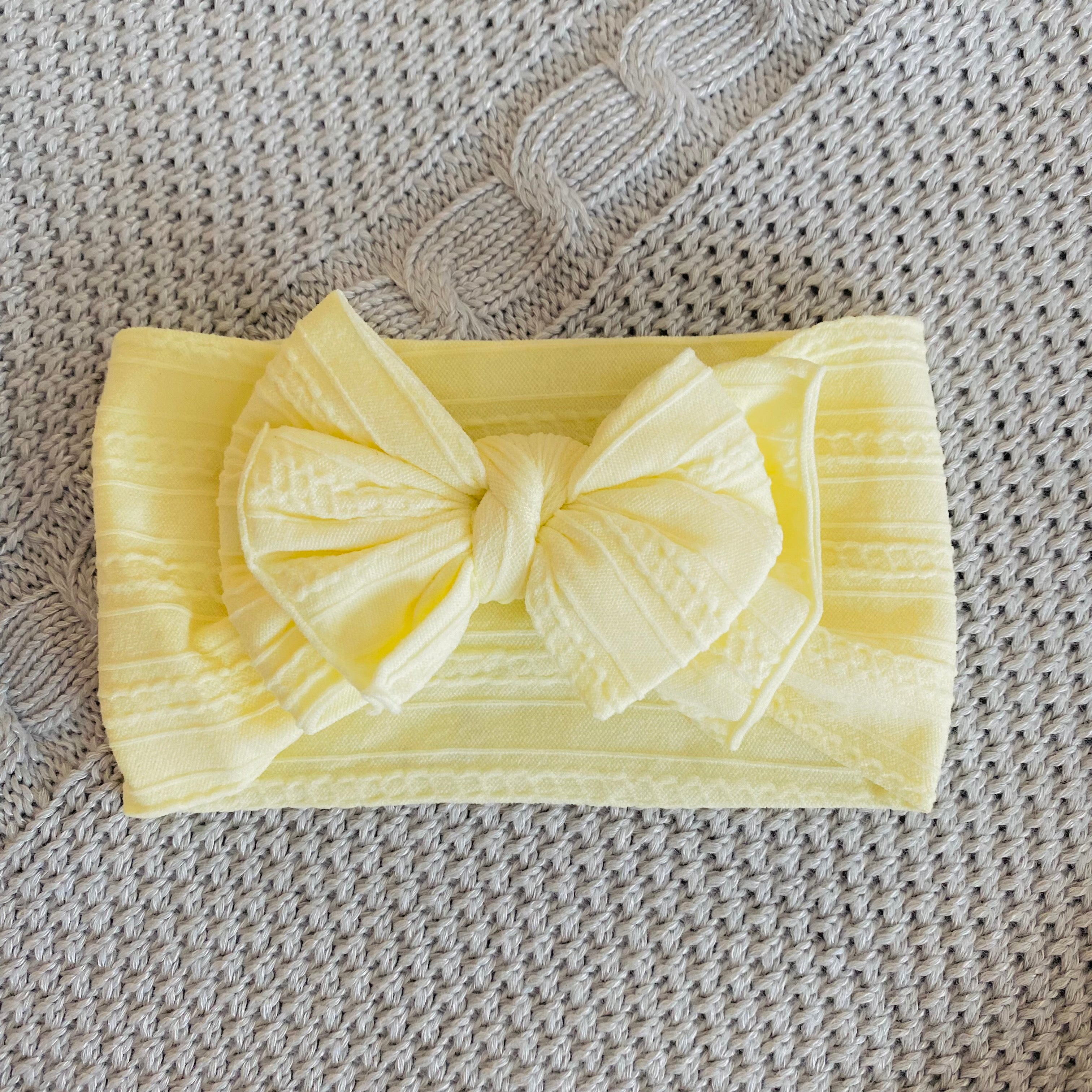 Fascia con fiocco medio motivo trecce