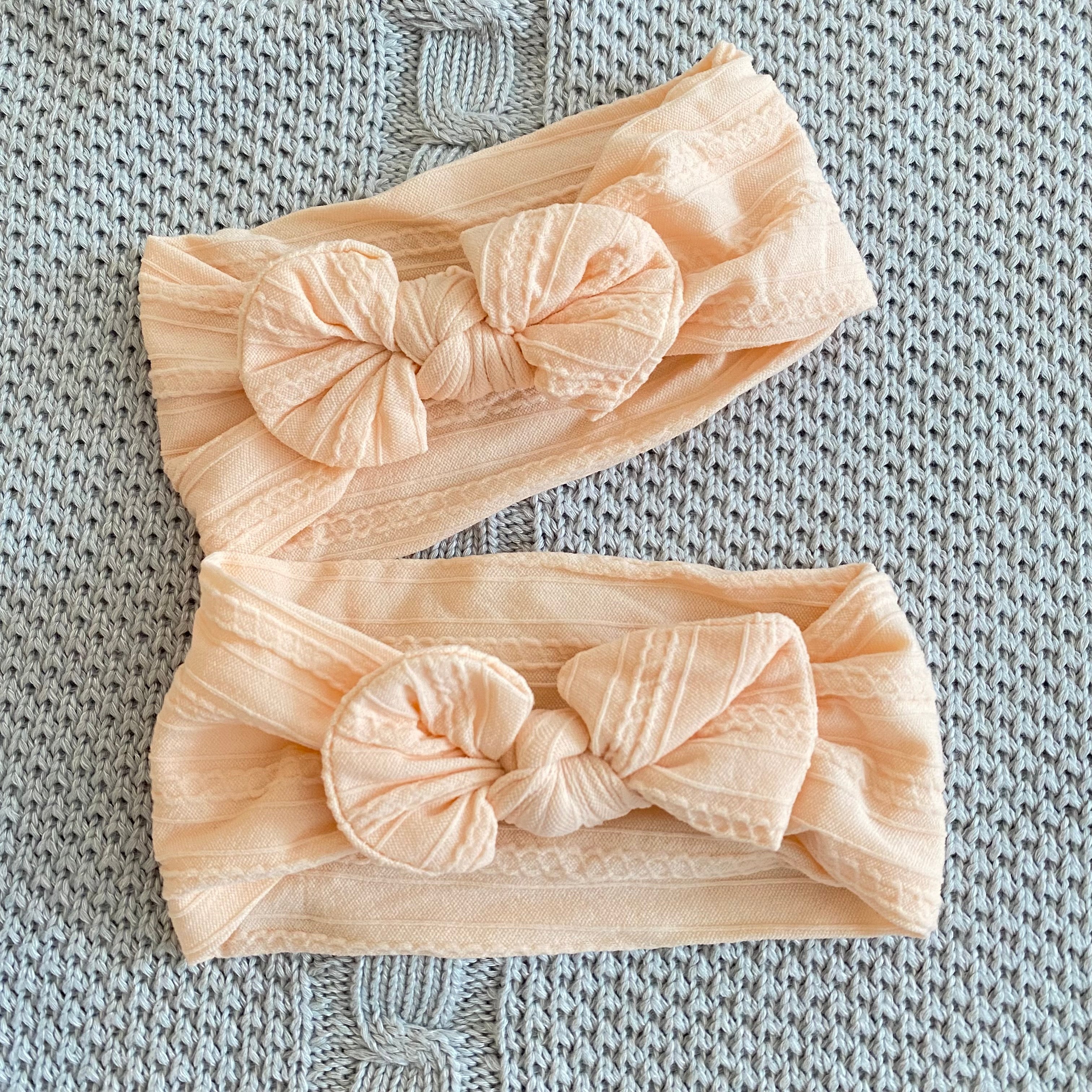 Fascia con fiocco piccolo motivo trecce