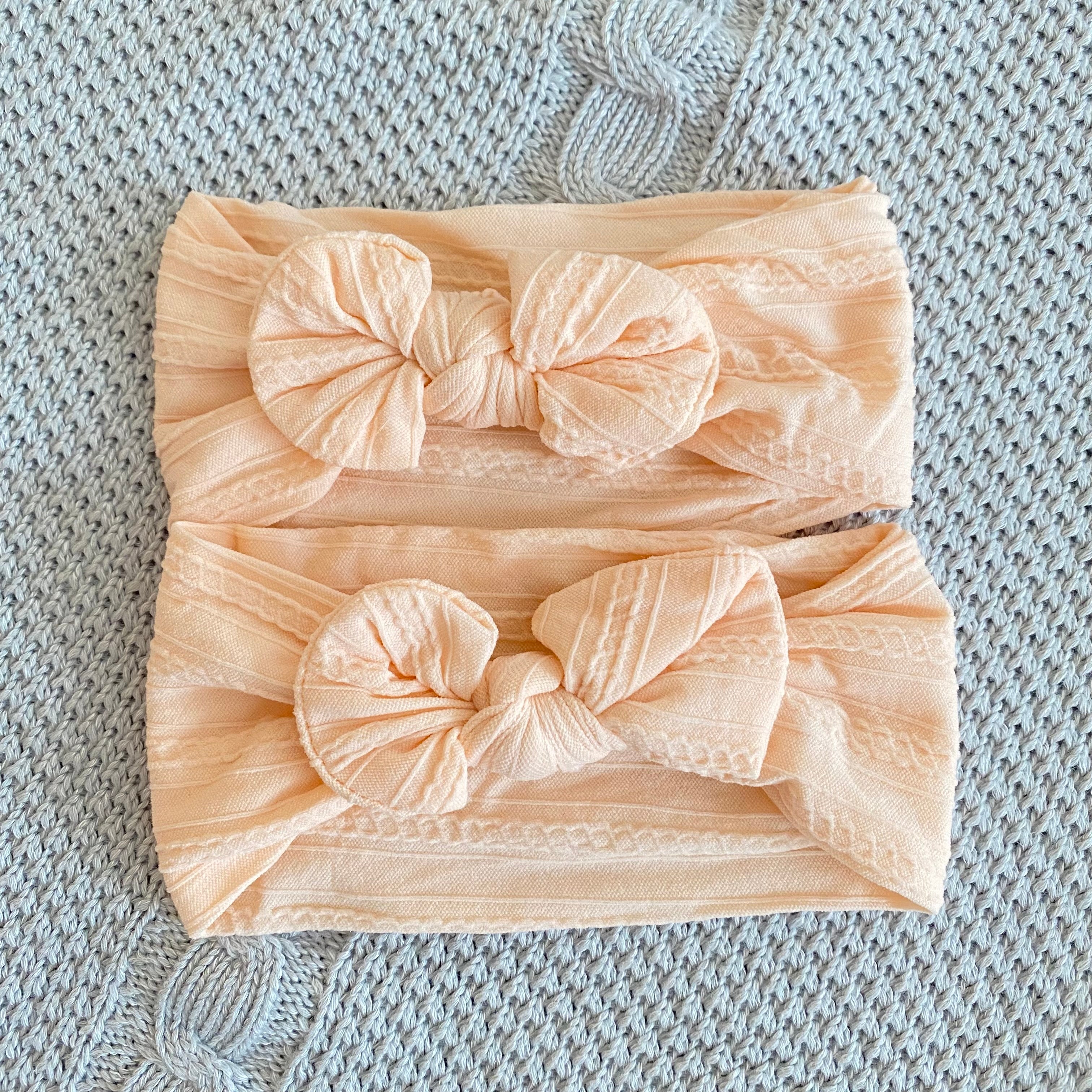 Fascia con fiocco piccolo motivo trecce