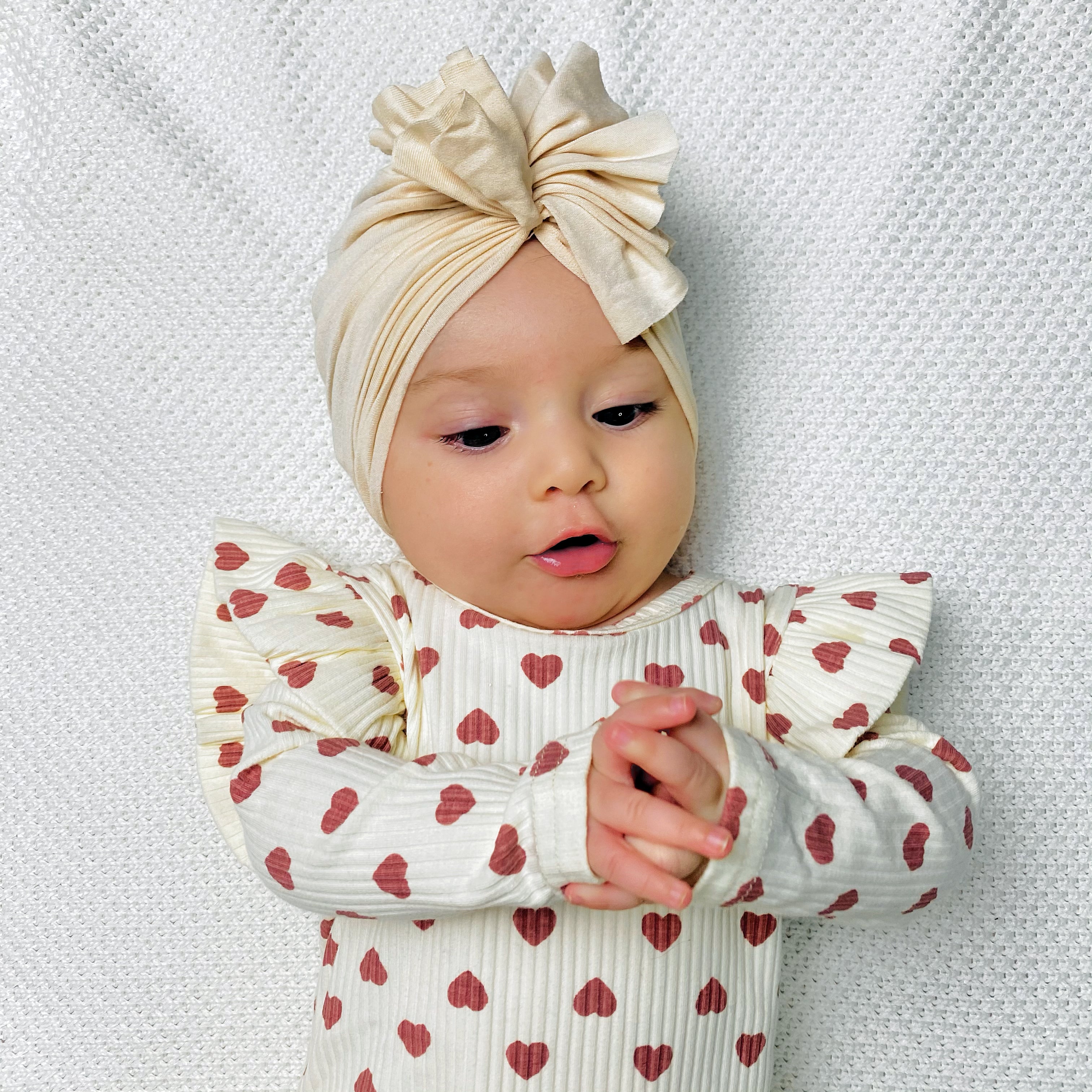 Body bianco crema con cuoricini