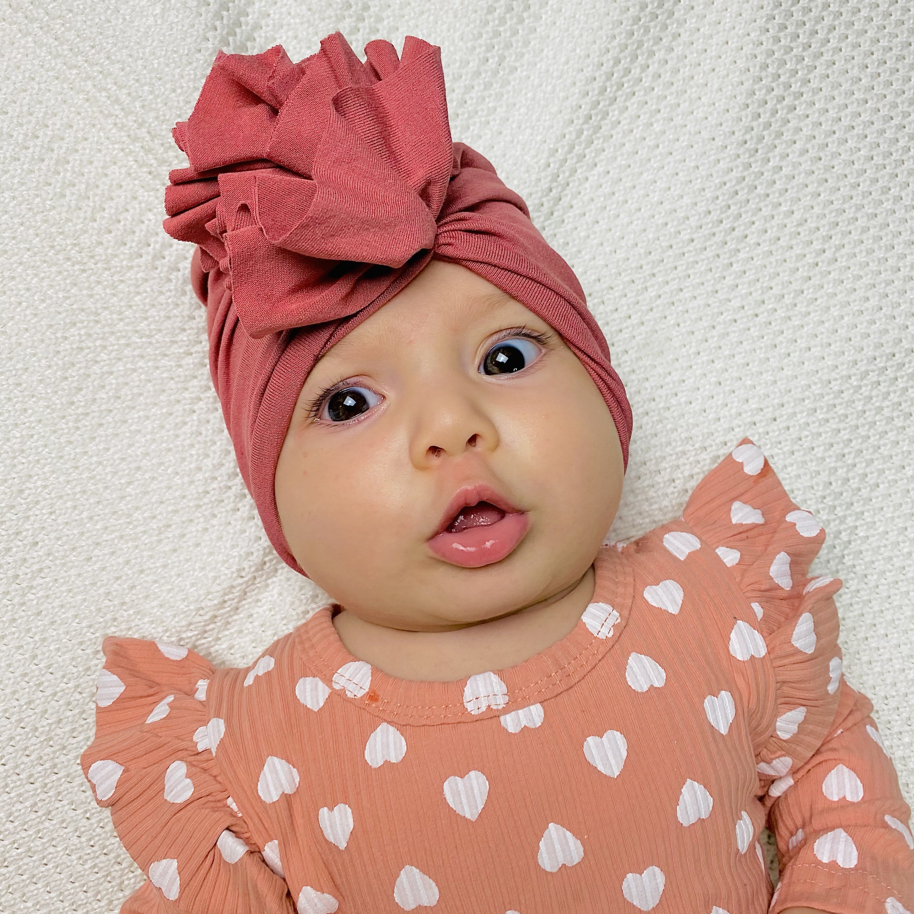 Body rosa salmone con cuoricini