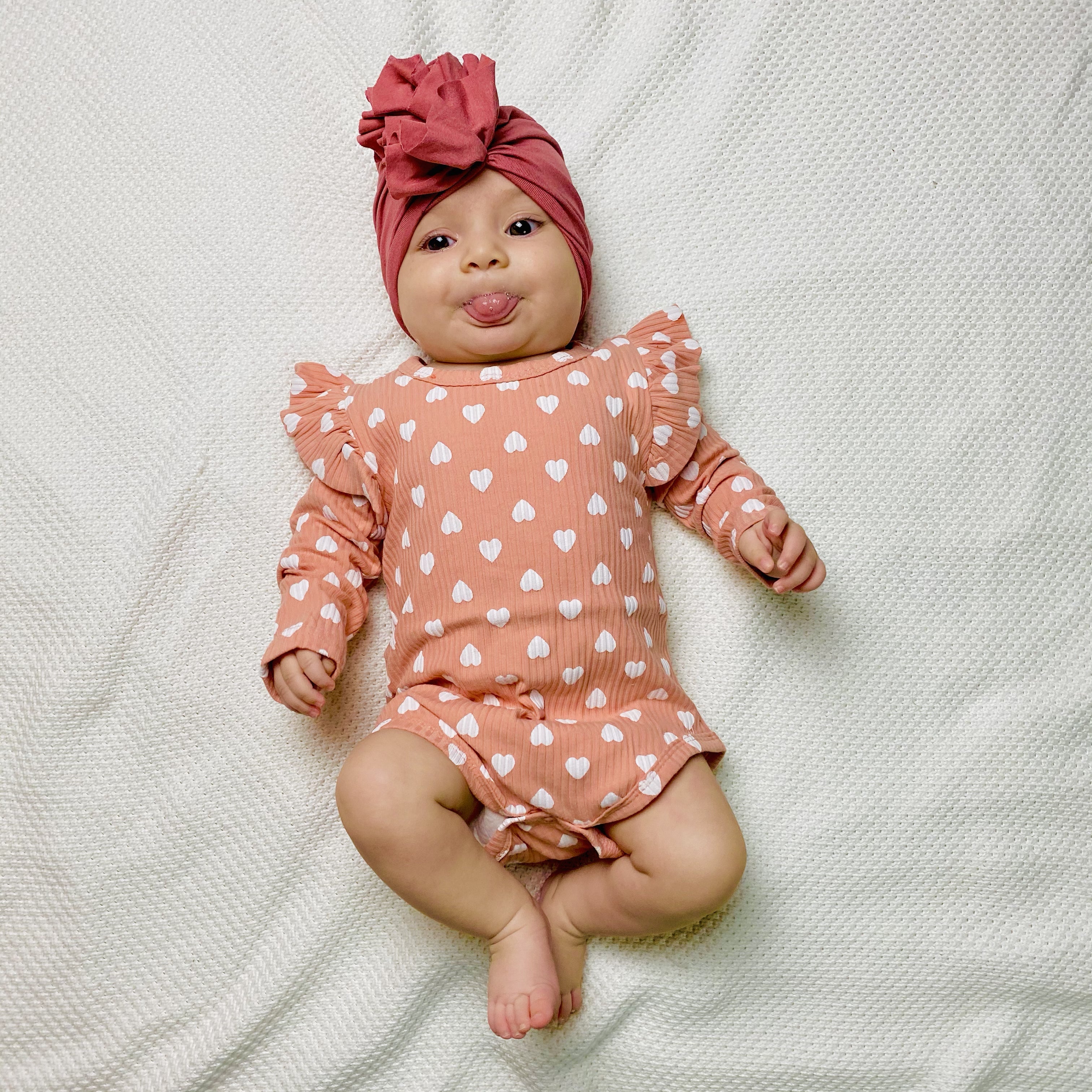 Body rosa salmone con cuoricini