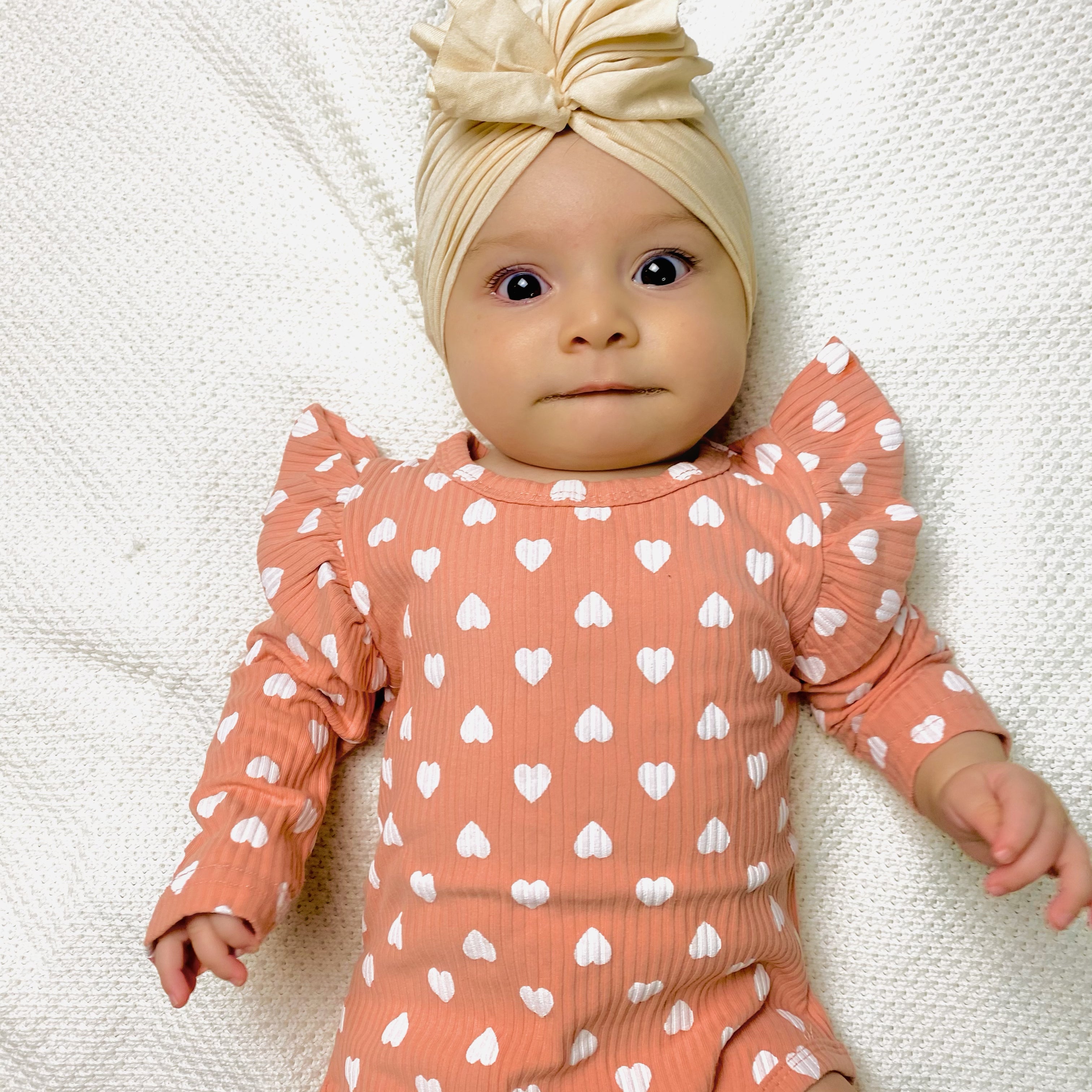 Body rosa salmone con cuoricini