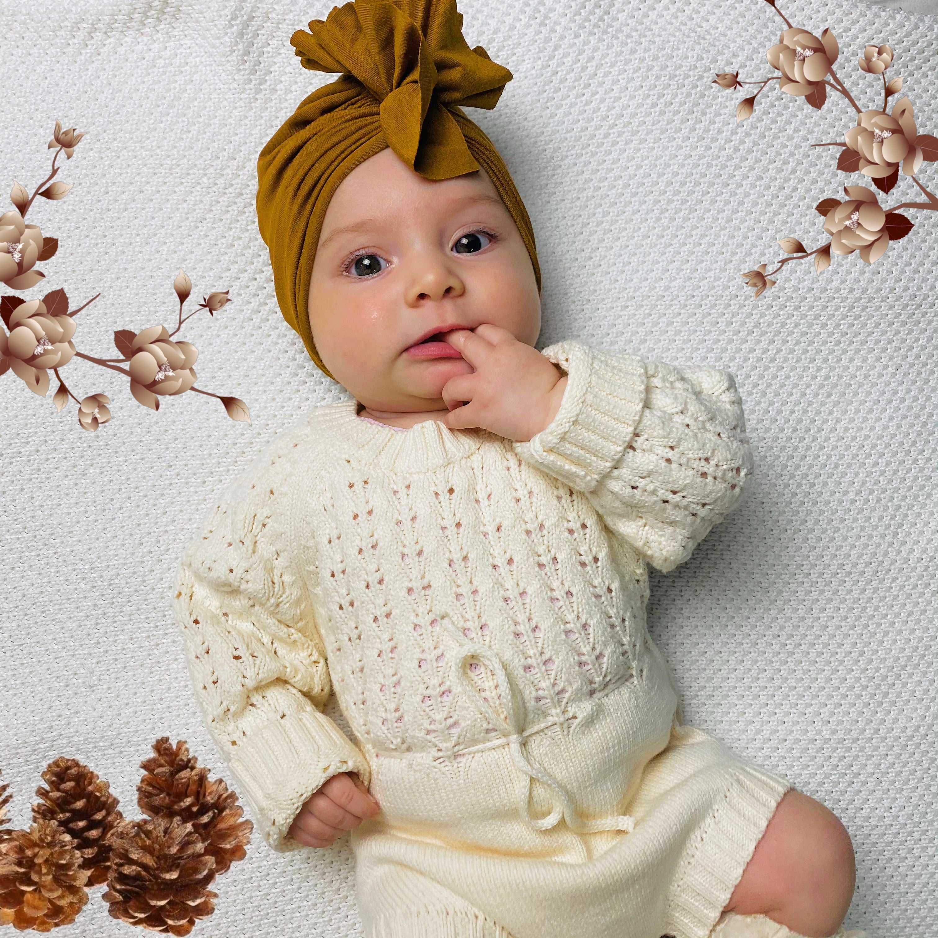 Pagliaccetto a maglia in bianco crema