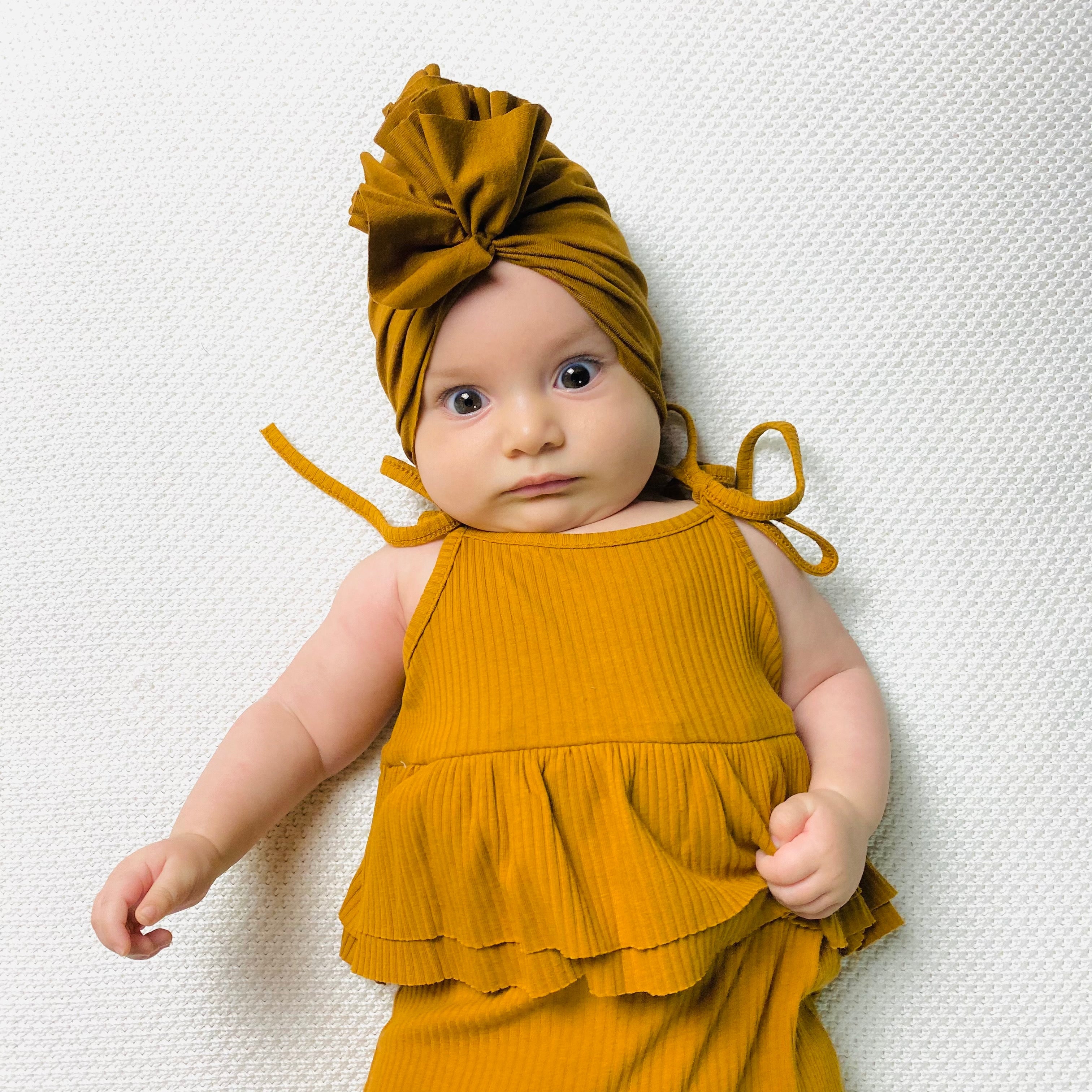 Tutina a costine con spalline regolabili