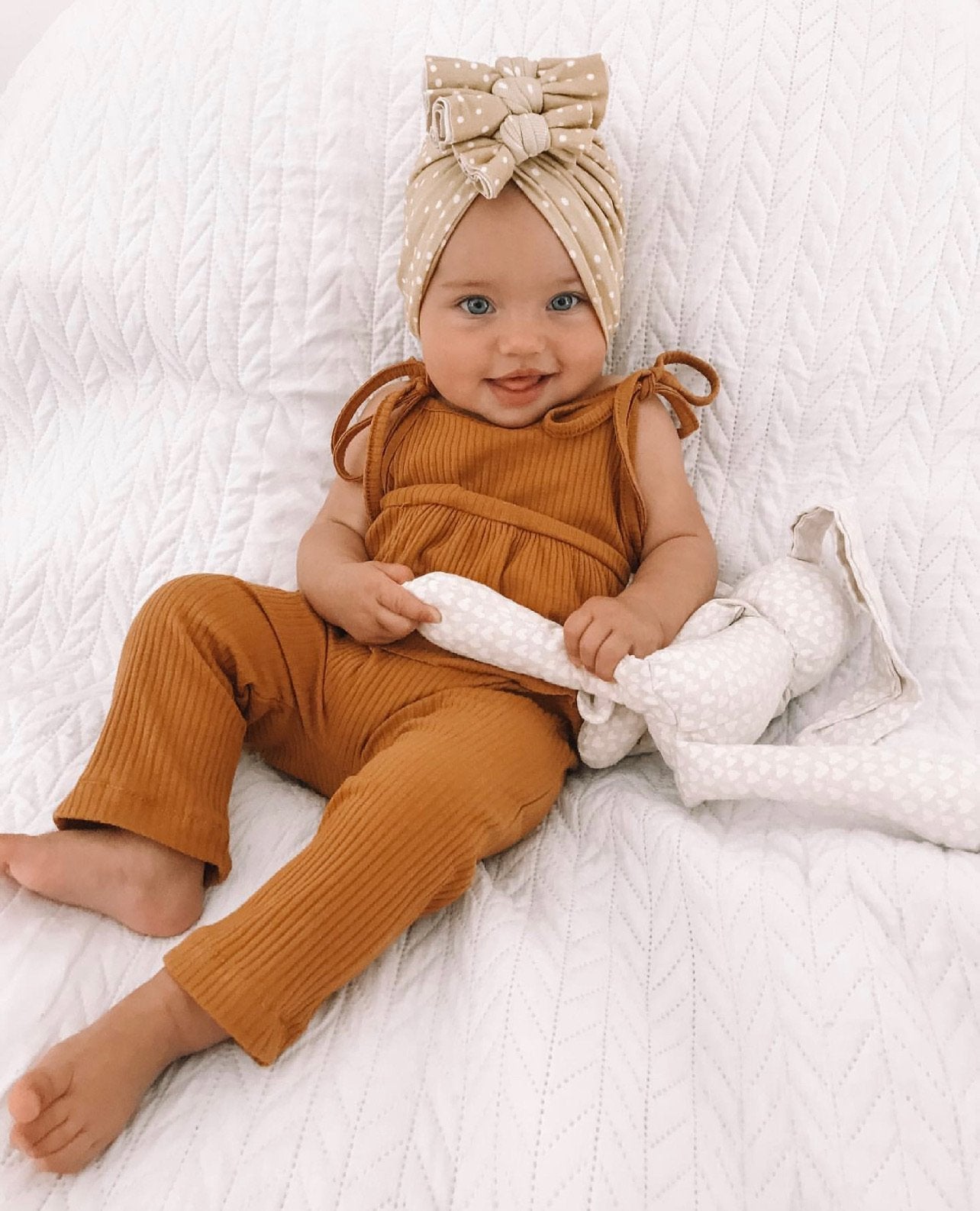 Tutina a costine con spalline regolabili