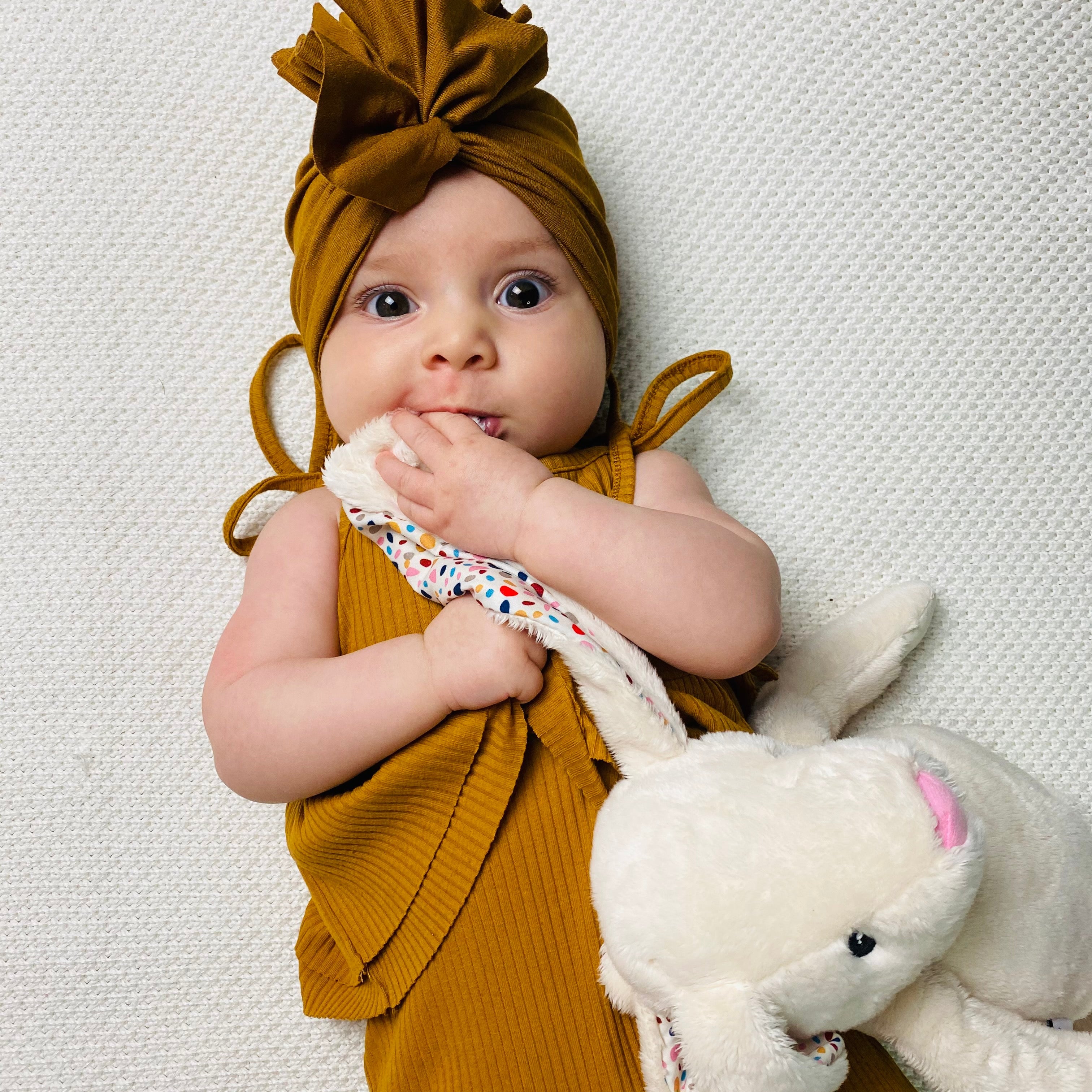 Tutina a costine con spalline regolabili