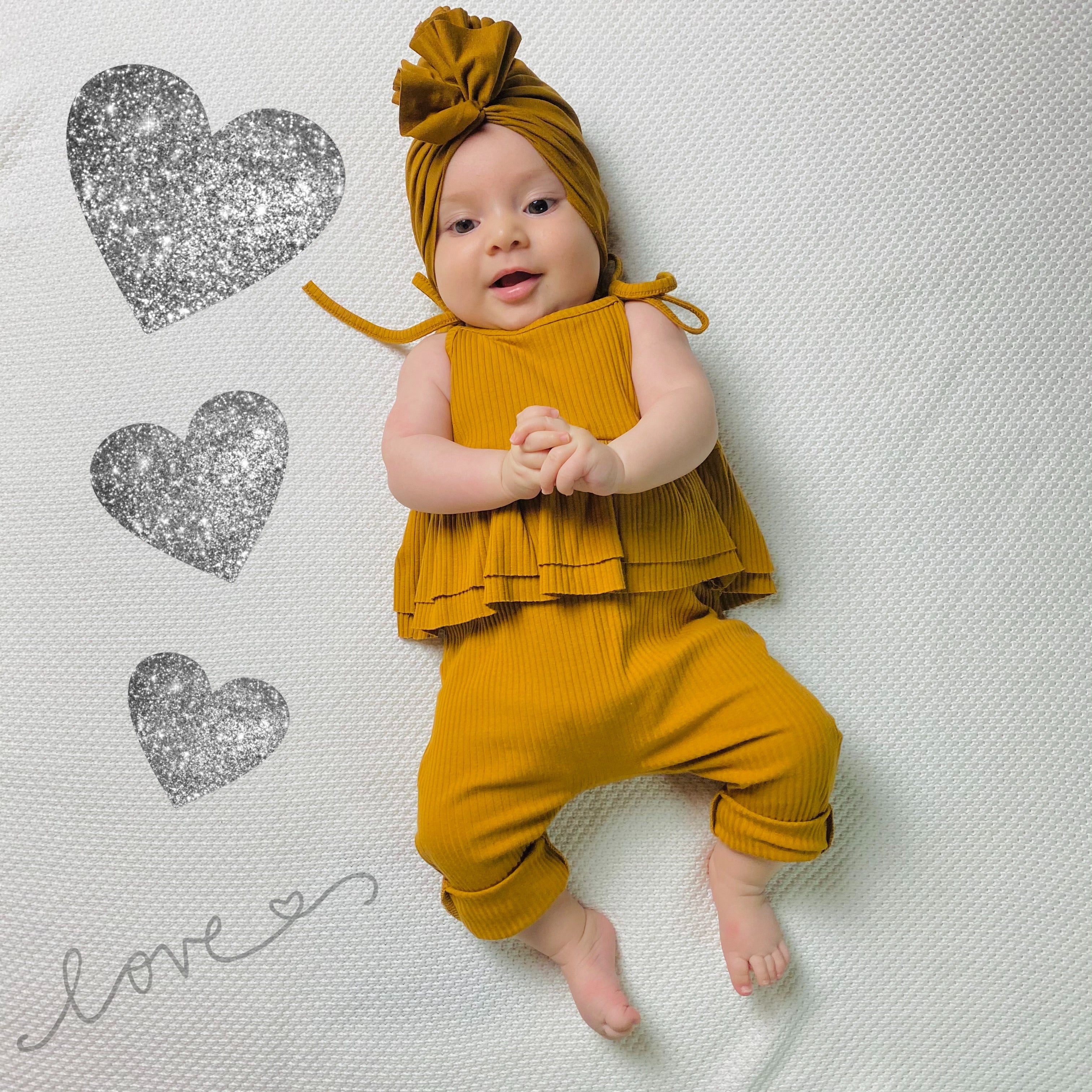 Tutina a costine con spalline regolabili